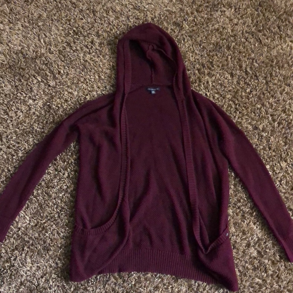 Hooded knit sweater.